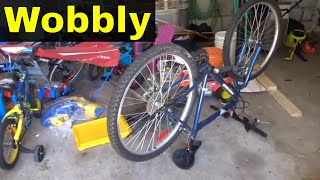 How To Straighten A Wobbly Bicycle WheelTutorial [upl. by Zeta653]