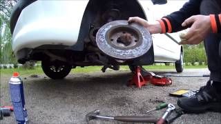 Peugeot 206  How To Change Front Brake Discs And Pads [upl. by Killam930]