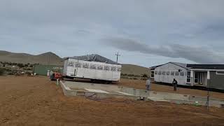 Watching a modular home get set on foundation [upl. by Eirrej]