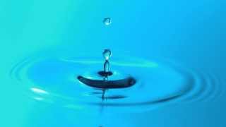 Slow Motion Water Droplet Falling Breaks Surface Tension and Makes Ripples in HD YouTube Video View [upl. by Oivalf]