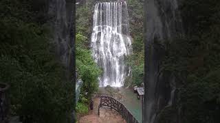 Waterfall under Glass Bridge is a skywalk bridge in Gulong Gorge China 古龍峽 瀑布 玻璃橋 [upl. by Osnerol]