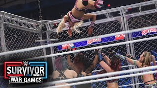 Charlotte Flair hits a moonsault from the top of the cage Survivor Series WarGames 2023 highlights [upl. by Annahsirhc]