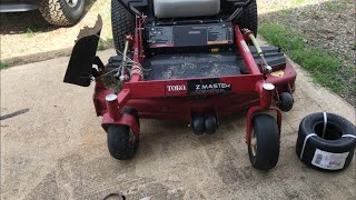 Toro Z master zero turn lawn mower front tire change [upl. by Nylzor623]