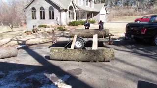 How to roll logs on a trailer Parbuckling [upl. by Wulf]