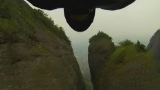 AMAZING Jeb Corliss performs flying dagger through 4metrewide valley in China at 160KPH [upl. by Gabriele]