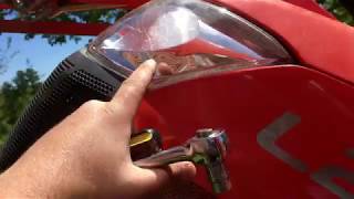 How to Remove Kubota Headlight Bulb [upl. by Erelia575]