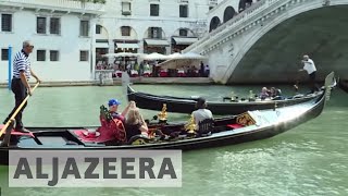 Antitourism sentiment grows in overcrowded Venice [upl. by Nuawaj550]