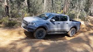 Ford Ranger Raptor vs Toyota HiLux Rugged X Review [upl. by Ettolrahc]