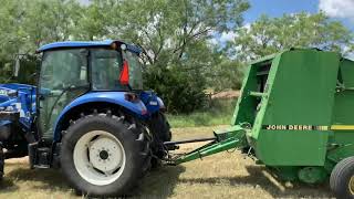 Powerstar 75 amp JD 335 round baler [upl. by Kinemod]