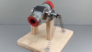 How to make flywheel free energy generator using spring mechanism  New Idea [upl. by Yorke]