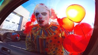 Scary Clown with Balloons Attacks Car [upl. by Farnham69]