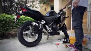 Installing a Leo Vince GP Corsa slipon 2012 Honda CBR250R [upl. by Estren15]