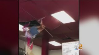 Woman Falls Through Restaurant Ceiling [upl. by Lion509]