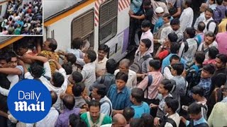 Train in Mumbai packed with commuters [upl. by Ainessey]