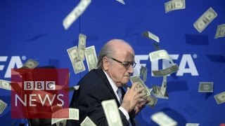 Moment Sepp Blatter was showered with fake dollar bills  BBC News [upl. by Kcirrej835]