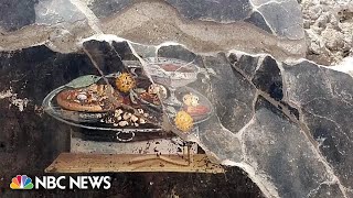 Newlydiscovered fresco in Pompeii looks remarkably like a pizza [upl. by Ishmael]