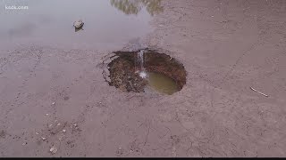 Sinkhole drains lake at Lone Elk Park [upl. by Ninos438]