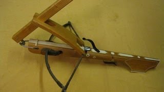 A Crossbow being strung  Armbrust spannen mit der Wippe 十字弓 [upl. by Llesirg]