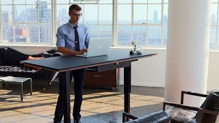 HeightAdjustable Standing Desks by BDI Furniture  Work Smart [upl. by Gayner]