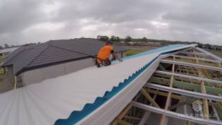 BUILDING A NEW HOME Part 10  Fitting A Colorbond Roof [upl. by Anecusa]