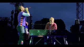 Chris Martin and a fan perform Everglow in Munich [upl. by Creight811]