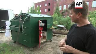 Artist turns dumpster into home from home [upl. by Nelyt]