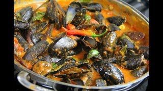 Mussels in a Spicy White Wine Tomato Sauce  CaribbeanPotcom [upl. by Ilise210]