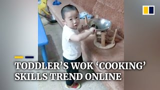 Chinese toddler’s wok ‘cooking’ skills trend online [upl. by Turrell]