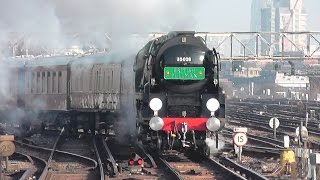 SR 35028 Clan Line storms through Clapham Junction 230115 [upl. by Manolo]