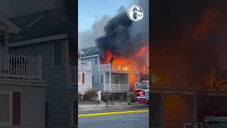 2alarm blaze destroys Jersey shore home video shows firefighter rescued from porch [upl. by Halla753]