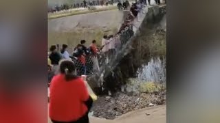 China Suspension bridge collapses after tourists shook it for fun [upl. by Stevana]