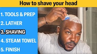 How to Shave Your Head Completely Bald 5 Step Tutorial  GQ [upl. by Anoerb]