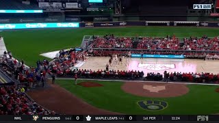 college basketball is being played on a baseball field [upl. by Bea]