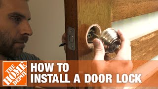 How to Install a Door Lock  The Home Depot [upl. by Rammaj415]