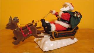 Gemmy  Animated Fabric Maché Santa In Sleigh [upl. by Georgina]