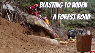 Blasting rock in road works [upl. by Nickolaus]