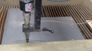 Cutting a part on the Omax WaterJet [upl. by Elik493]