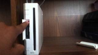 How To Connect Your Wii Remote To Your Wii [upl. by Htiduj]