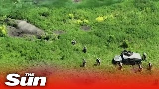 Incredible video shows Ukrainian soldiers in Humvees storming Russian trenches [upl. by Nibla]