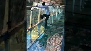 Fake glass break terrifies tourist in China glass bridge [upl. by Ianaj]