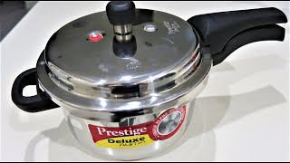 Prestige Deluxe Alpha Stainless Steel Pressure Cooker 4 Litres Review and Demo [upl. by Ylra223]