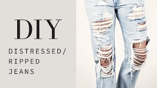 HOW TO  DIY Distressed  Ripped Jeans Tutorial [upl. by Sisson]