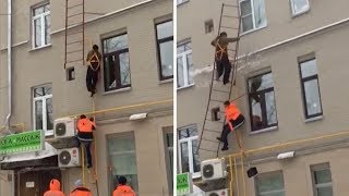 Ladder Breaks And Falls Off Wall As Workers Climb [upl. by Burris664]