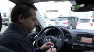 2014 Mazda CX5 GT How to program your door locks when you walk away [upl. by Ahsinna]