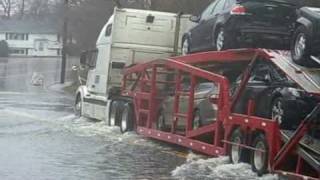 Drivers navigate a flooded Sprague Street in Dedham [upl. by Erdried]