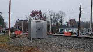 103024 Amtraks downeaster approaches Main st in Plaistow NH heading to Boston MA [upl. by Swithin]