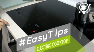 How to use the electric cooktop  Cómo usar la vitrocerámica  EasyTips [upl. by Ellered]