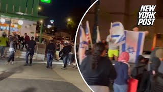 Gal Gadot’s screening of Hamas terror attack film ends in mass brawls between protesters [upl. by Anih]