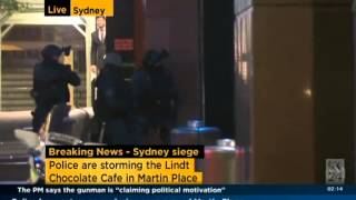 Sydney siege Heavily armed police storm Lindt cafe in Martin Place [upl. by Aicekat688]