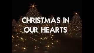 CHRISTMAS IN OUR HEARTS  Lyrics [upl. by Alomeda]